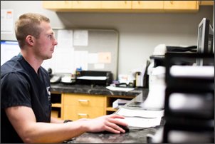 Medical assistant on the computer